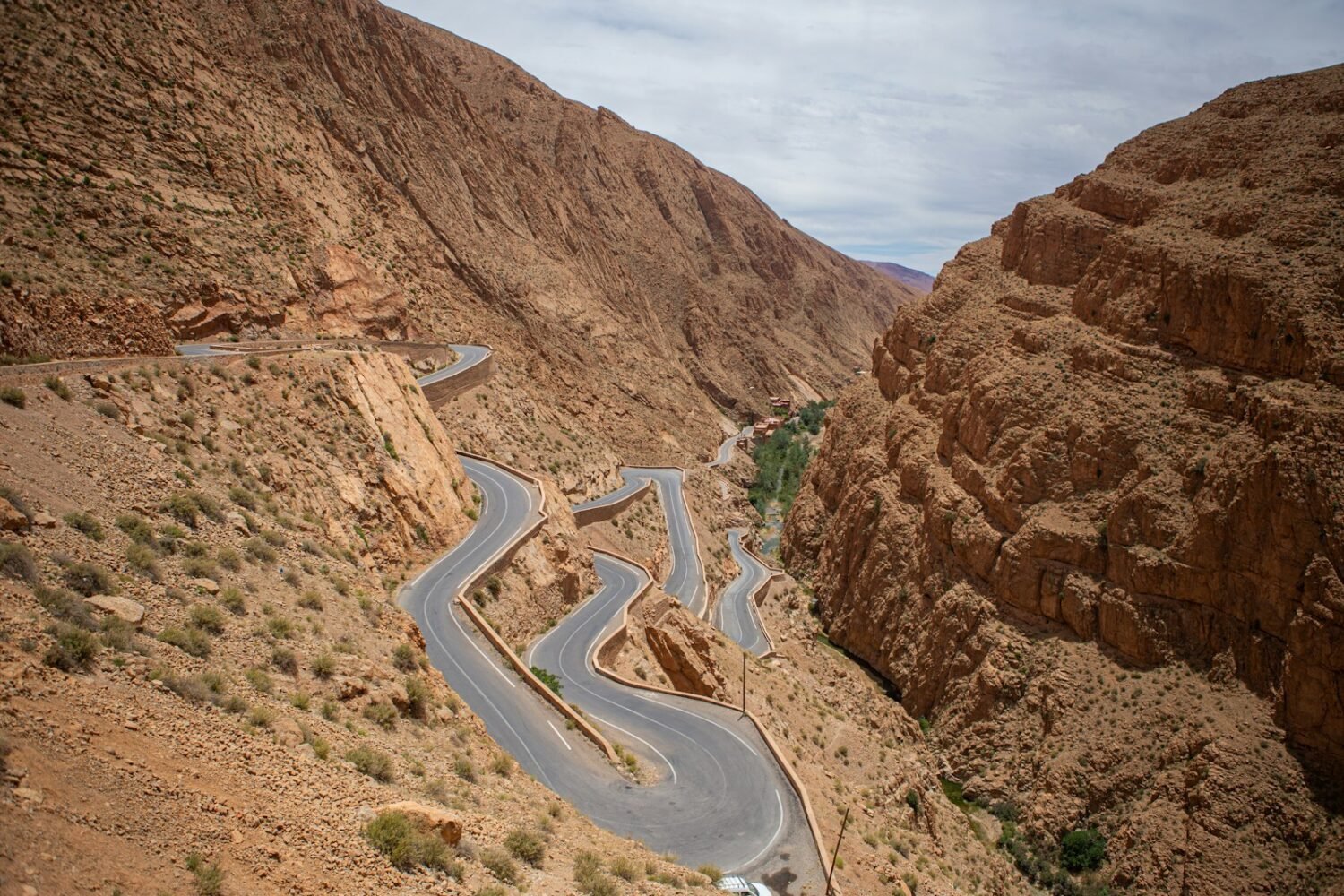 A winding road in the middle of a desert